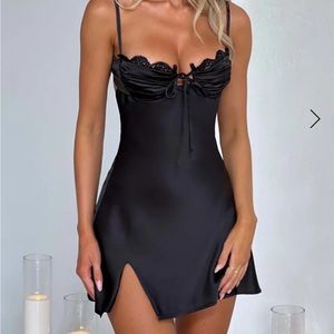 Mini black dress with lace details